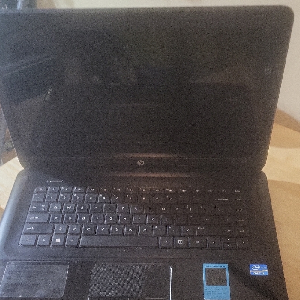 HP Black Laptop with Matte Finish and Clamshell Design